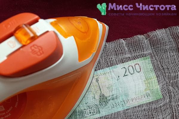 Banknoto dezinfekavimas lygintuvu
