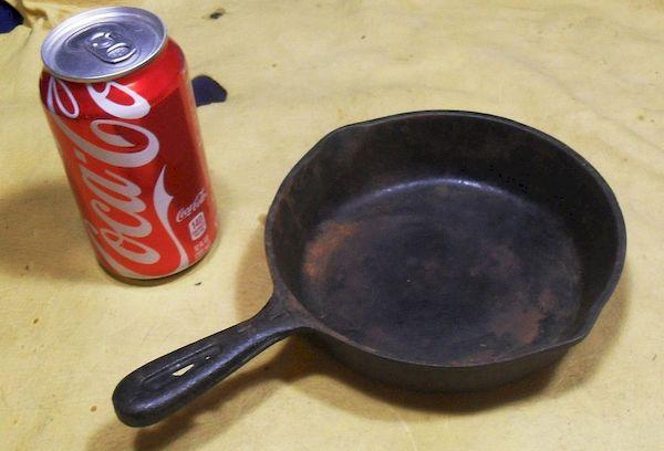 Išvalykite keptuvę su Coca Cola